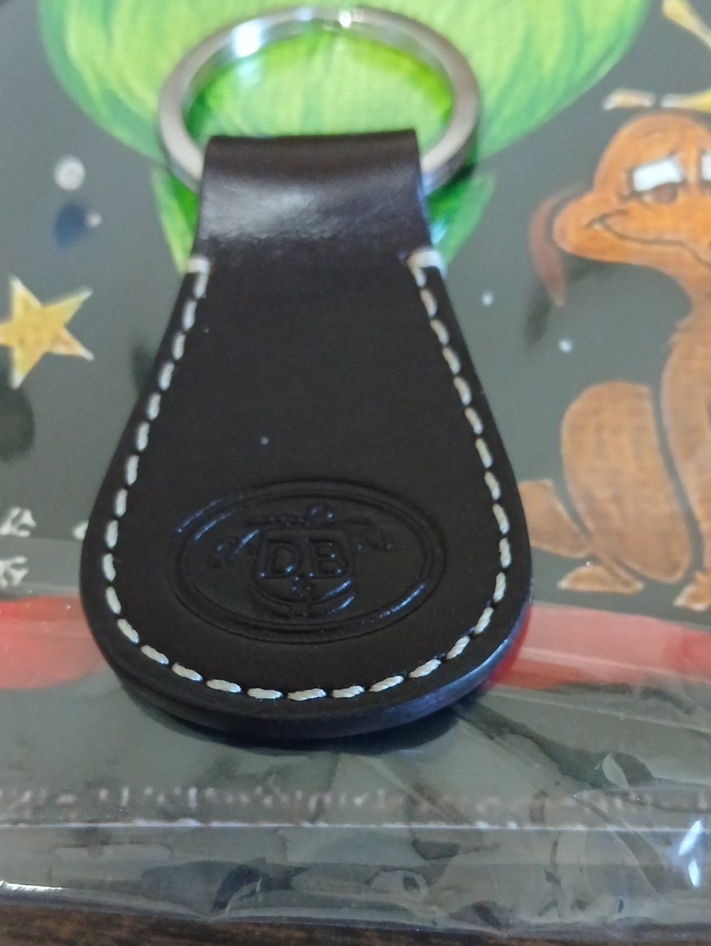 Dooney & Bourk Embossed Black Leather Keychain with White Stitching
